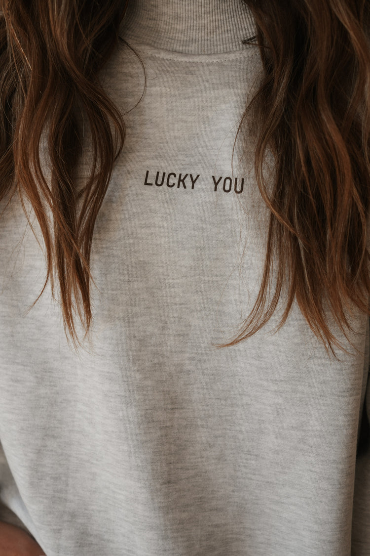 ‘LUCKY YOU’ MOCK NECK